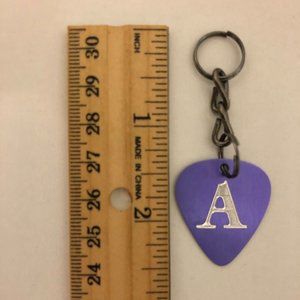 Two-Sided Diamond Etched Monogrammed Purple Guitar Picks by Guitar Pick Geek